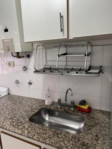 Köök või kööginurk majutusasutuses Dto en SANTA TERESITA rento por semana de fin de semana a fin de semana, a 1 cuadra de la playa y 4 del centro p 4 a 6 pax