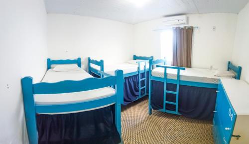 Postel nebo postele na pokoji v ubytování Hostel Dragão do Mar Fortaleza