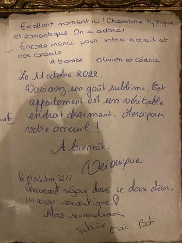 a letter from novelist to person in handwriting at Gîte le médiéval in Sarlat-la-Canéda
