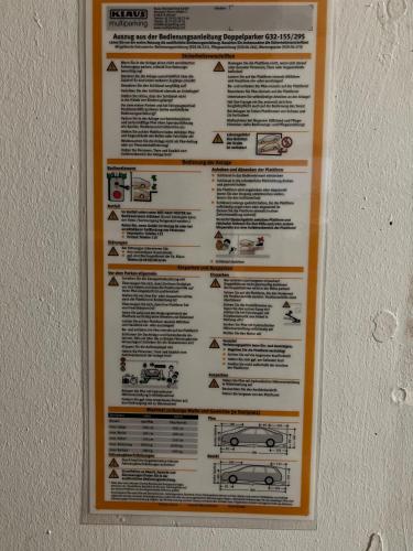 a poster on the wall of a car manual at Ferienwohnung mit Loggia in Münster