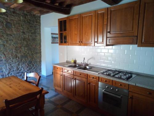 Η κουζίνα ή μικρή κουζίνα στο Casa vacanze La Tosca