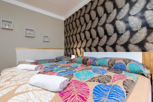 Postel nebo postele na pokoji v ubytování Apartmány Alice