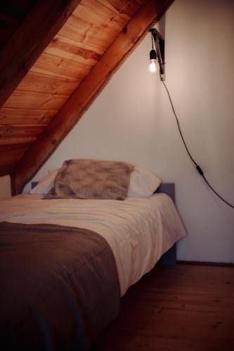 Cama o camas de una habitación en Osada Przejrzysko