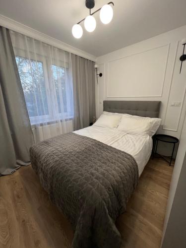 Posteľ alebo postele v izbe v ubytovaní Igart Studio