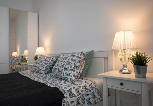 Posteľ alebo postele v izbe v ubytovaní Luxus Apartament Fitness&Spa z sauną i siłownią