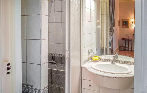 A bathroom at Beautiful Apartment In Ocquerre With Outdoor Swimming Pool