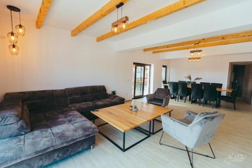 Posezení v ubytování Pensiunea Căsuța cu Stuf