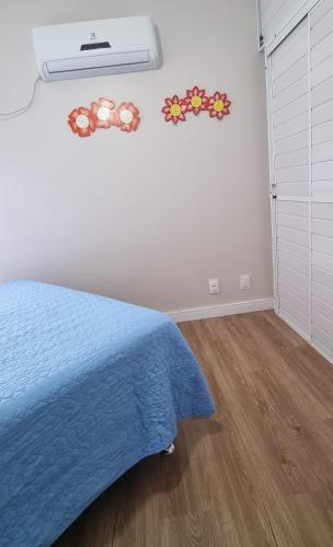 Ένα ή περισσότερα κρεβάτια σε δωμάτιο στο Apartamento Pe na Areia - Meia praia - Itapema Sc