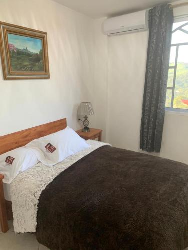 Postel nebo postele na pokoji v ubytování Casa Lolita