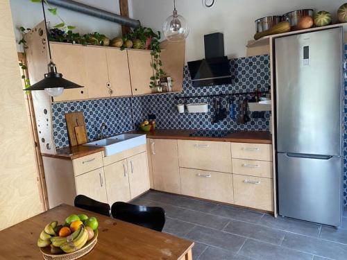Η κουζίνα ή μικρή κουζίνα στο Agradable casa de bio-construcción con chimenea