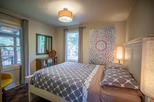 a bedroom with a bed and a window at Valley Vista A Wine Country Escape in Guerneville