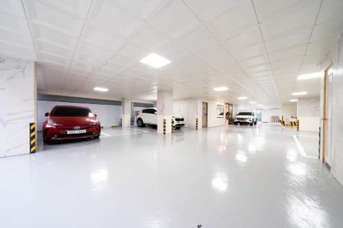 a garage with a car parked in it at Ytt Hotel in Busan