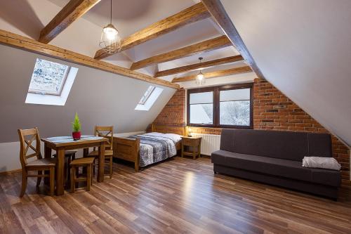 Posteľ alebo postele v izbe v ubytovaní ARAMIKA apartamenty