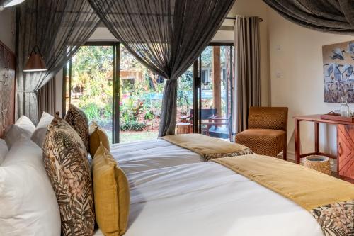 Voodi või voodid majutusasutuse Shongwe Oasis toas