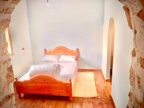 Ein Bett oder Betten in einem Zimmer der Unterkunft Villa M