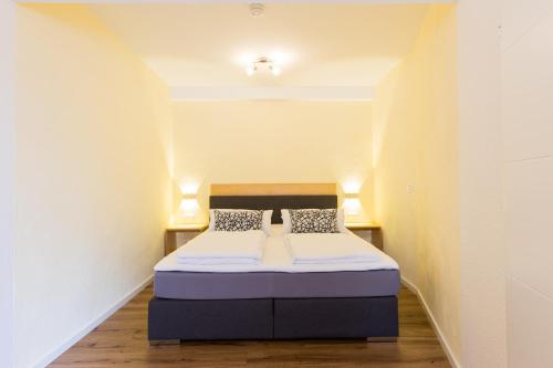 Postel nebo postele na pokoji v ubytování Pension Sonne Appartements