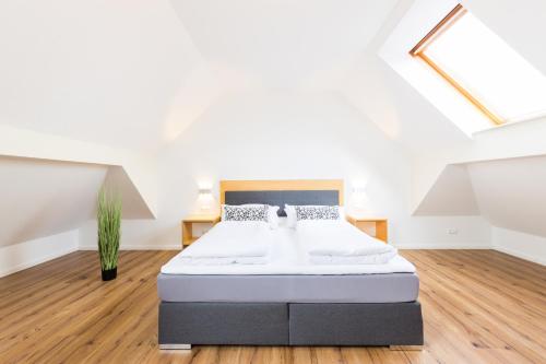 Postel nebo postele na pokoji v ubytování Pension Sonne Appartements