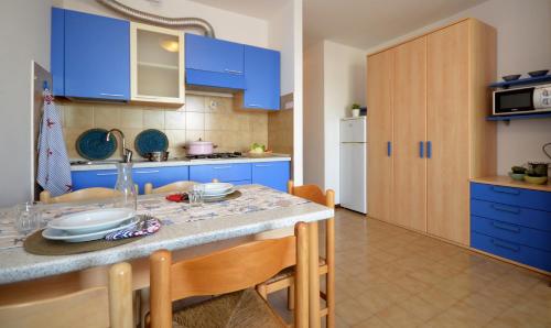 Η κουζίνα ή μικρή κουζίνα στο Residenza Olimpo