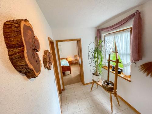 a view of a room with a room with a window at Apartment Janik by Interhome in Bischofsmais