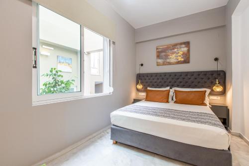 Cama o camas de una habitación en Minaret Suites and Apartments