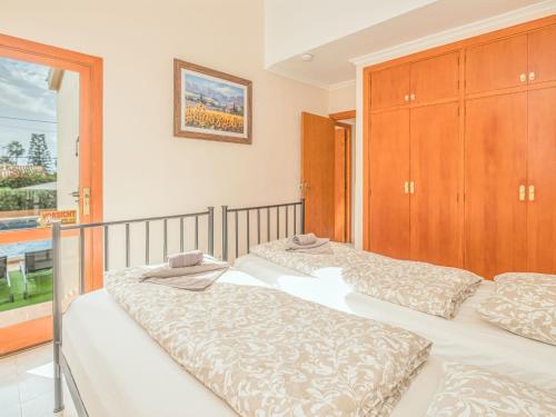 A bed or beds in a room at Holiday Home Cala Pi - CPI130 by Interhome