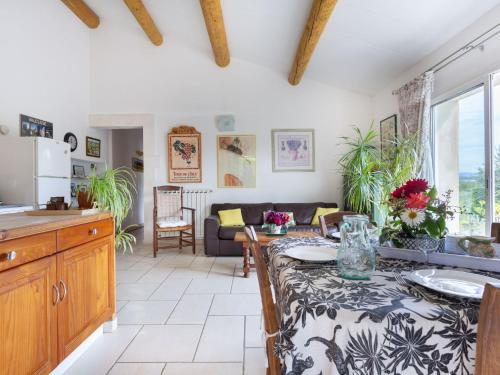 a kitchen and living room with a counter top at Holiday Home Les Vignes by Interhome in Ménerbes