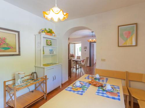 a kitchen and a dining room with a table at Holiday Home Le Querce - PIT550 by Interhome in Atri