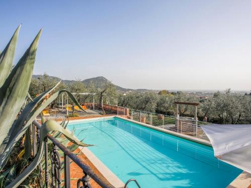 a swimming pool on the roof of a house at Holiday Home Borgo della Limonaia-4 by Interhome in Pieve a Nievole