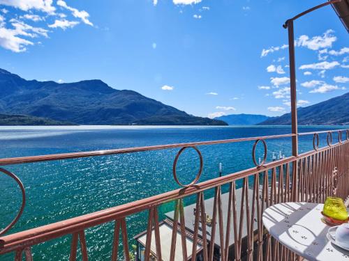 a balcony with a view of a body of water at Apartment Casa Gemma by Interhome in Domaso