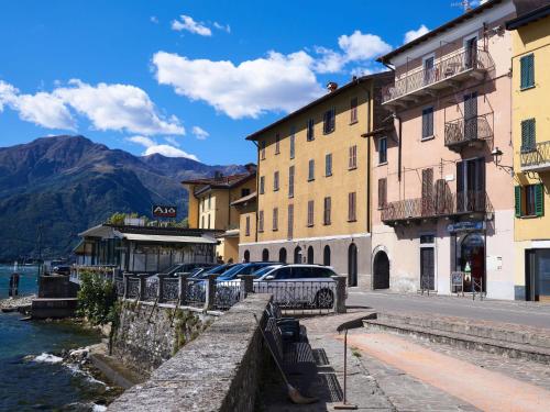 a street in a town next to a body of water at Apartment Casa Gemma by Interhome in Domaso