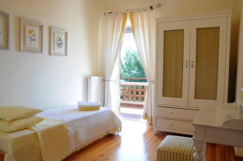 Voodi või voodid majutusasutuse Konstantinos Siviri Nautilos Residence toas