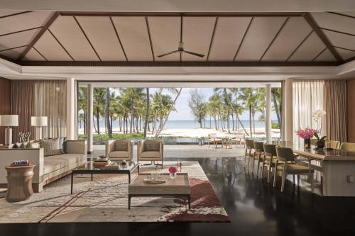a living room with a view of the ocean at Regent Phu Quoc in Phú Quốc