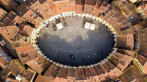an overhead view of a large circle of buildings at La Casa Di Emma in Lucca