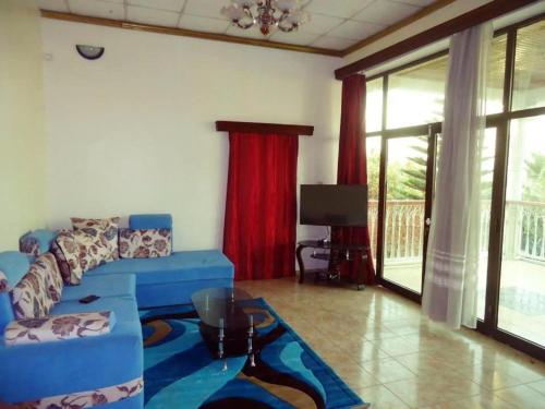 Χώρος καθιστικού στο Golf View Apartment