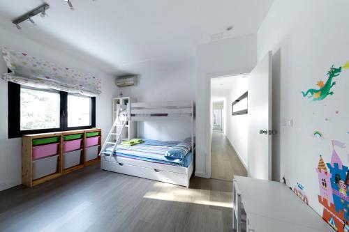Ένα ή περισσότερα κρεβάτια σε δωμάτιο στο Villa Marmudella