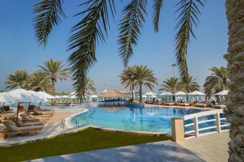 a view of the pool at the resort at Radisson Blu Hotel & Resort, Abu Dhabi Corniche in Abu Dhabi