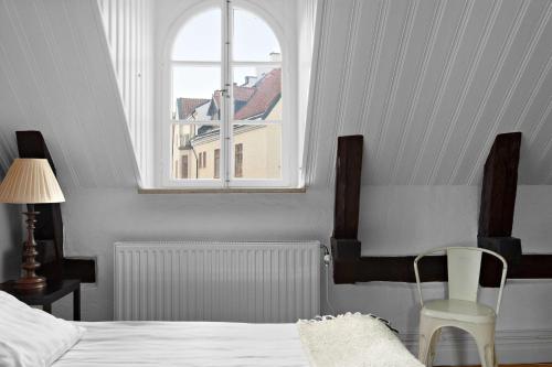 Un ou plusieurs lits dans un hébergement de l'établissement Donners Hotell