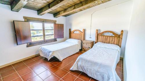 Krevet ili kreveti u jedinici u objektu Cortijo Vaquero Rural Loja by Ruralidays