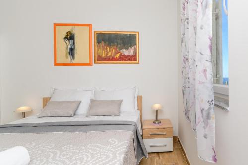 Ένα ή περισσότερα κρεβάτια σε δωμάτιο στο Rooms FOREVER