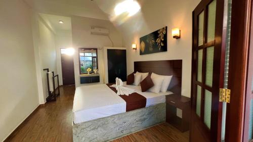 Sea Pink Residence Bentotaにあるベッド