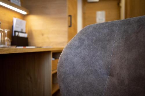 a close up of the back of a office chair at Park Hotel Laim in Munich