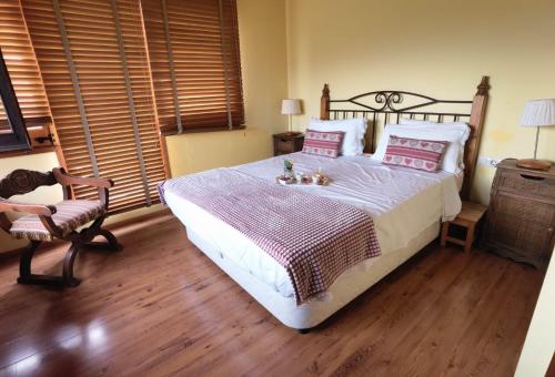 Llit o llits en una habitació de Era del Roio - Acogedora casa reformada en entorno único