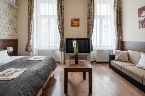 Predel za sedenje v nastanitvi Elit Boutique Rooms- Best Location by BQA