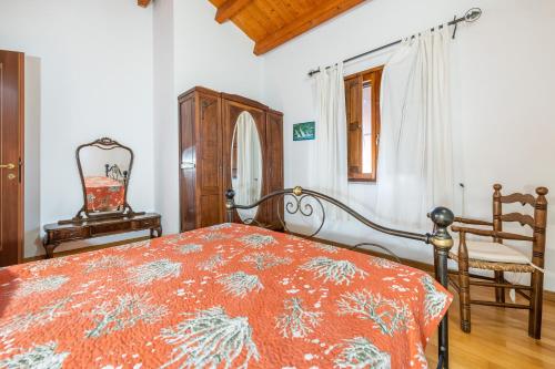 Postel nebo postele na pokoji v ubytování Villa Camilla