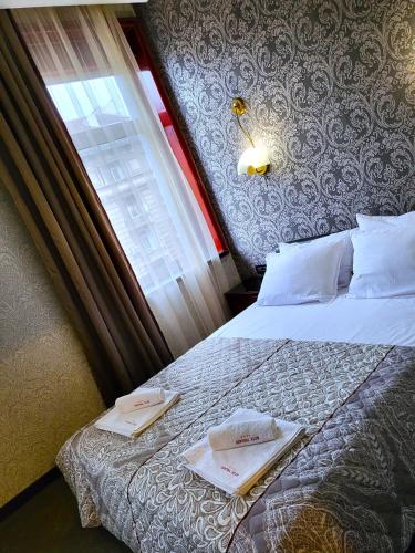 Katil atau katil-katil dalam bilik di Hotel Central Club Sofia