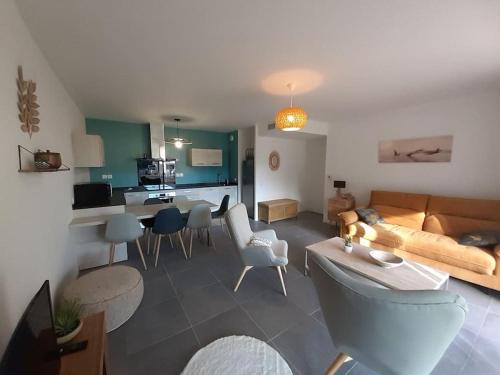 Posedenie v ubytovaní Dune Blanche 300 m de l'Océan, appartement neuf 6 personnes