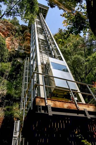 a spiral staircase with a building on top of it at Lions Rock Rapids - Luxury Tented Camp in Hazyview