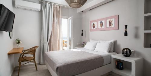 Katil atau katil-katil dalam bilik di Naxos Skyline Luxury Villas