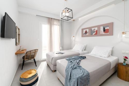 Katil atau katil-katil dalam bilik di Naxos Skyline Luxury Villas