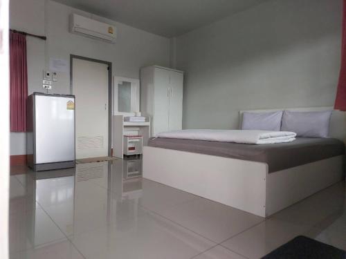 Katil atau katil-katil dalam bilik di Sailom Resort​